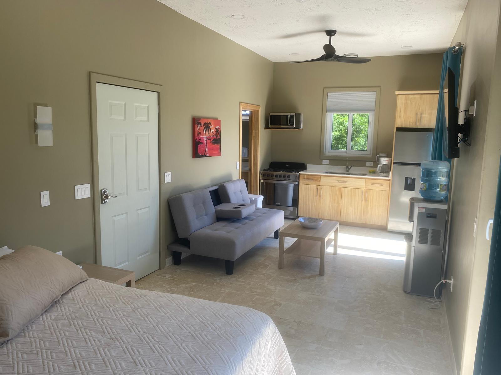 Room 1 queen bed studio interior